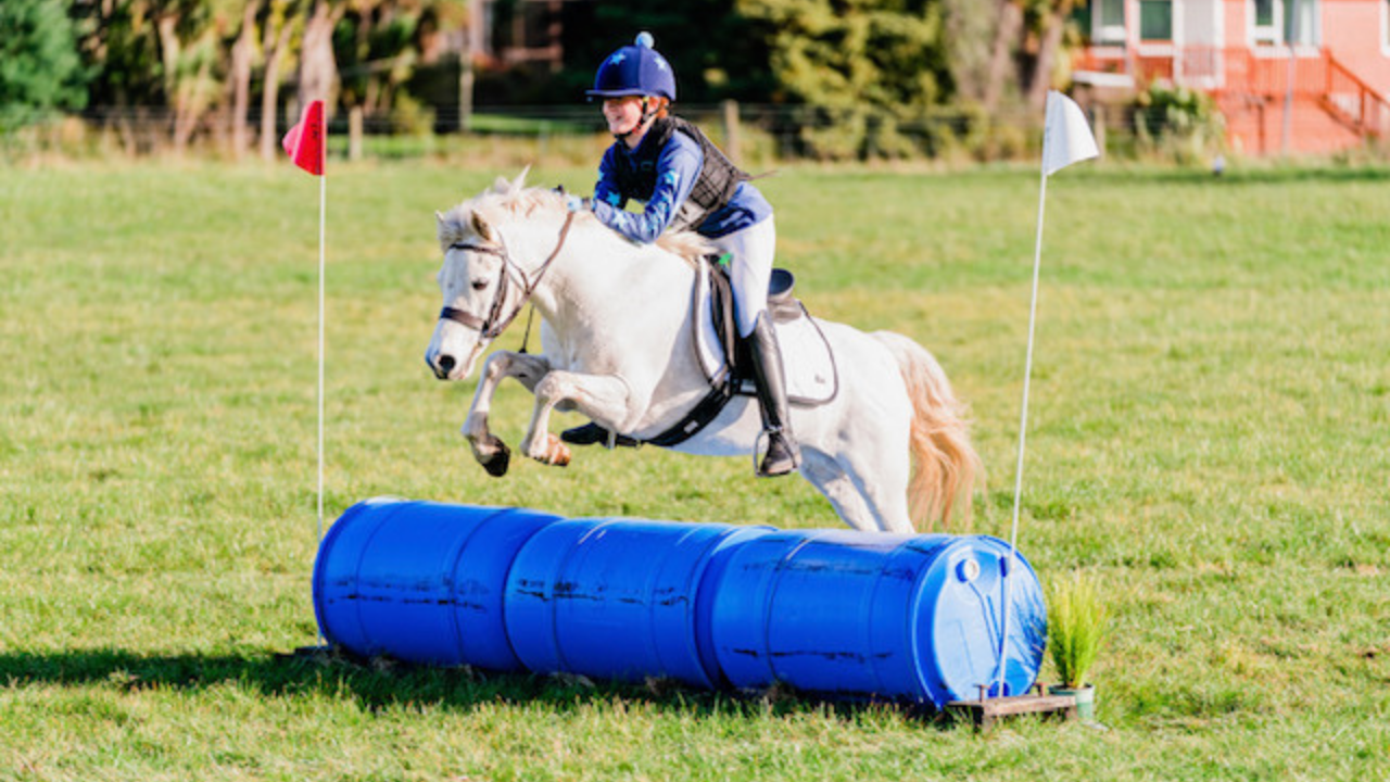 Karlee and Cedar riding cross country event